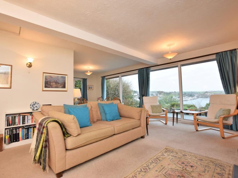 Spacious lounge/ dining area with river views