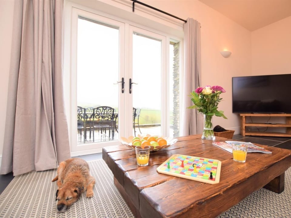 The warm and welcoming lounge with a garden view