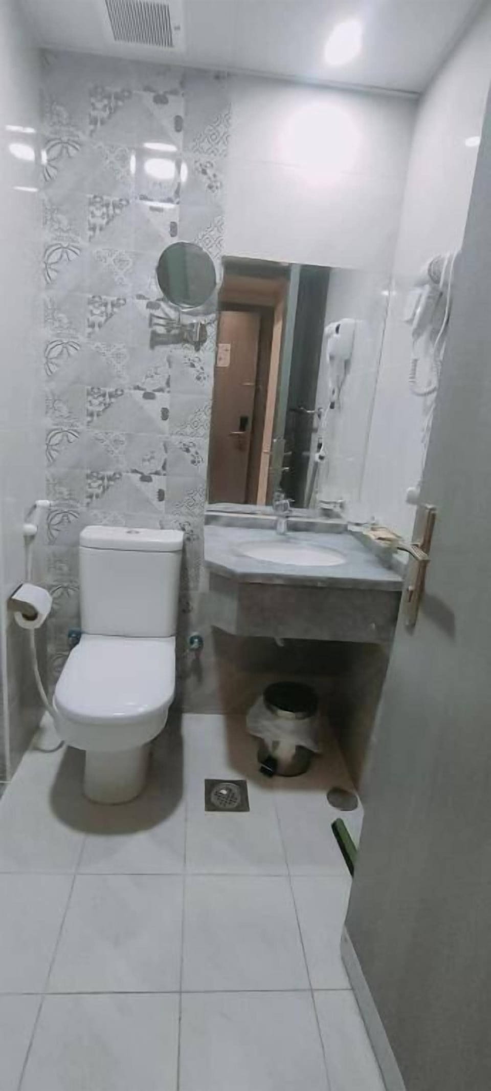 Combined shower/tub, hair dryer, towels, soap