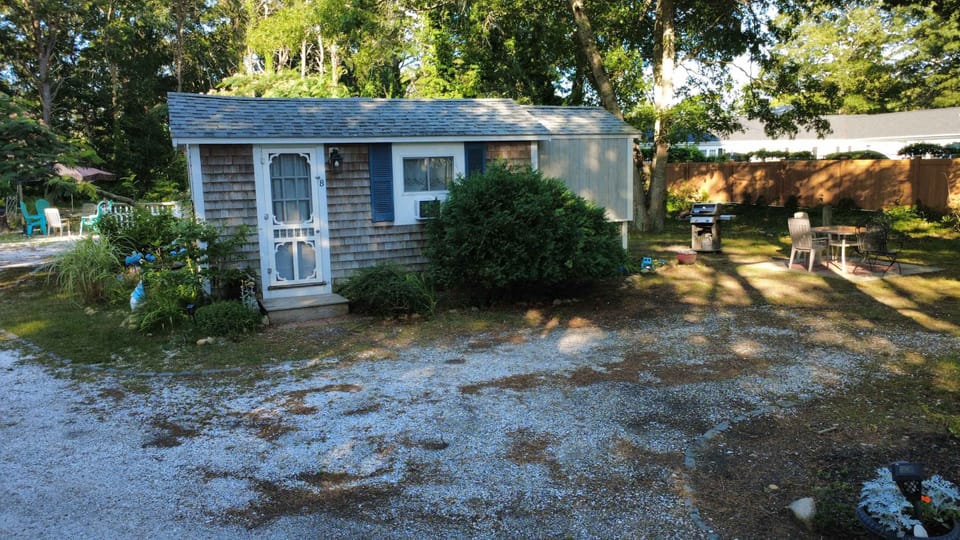 Front View, with Grill and side patio, Parking is right in front of cabin.