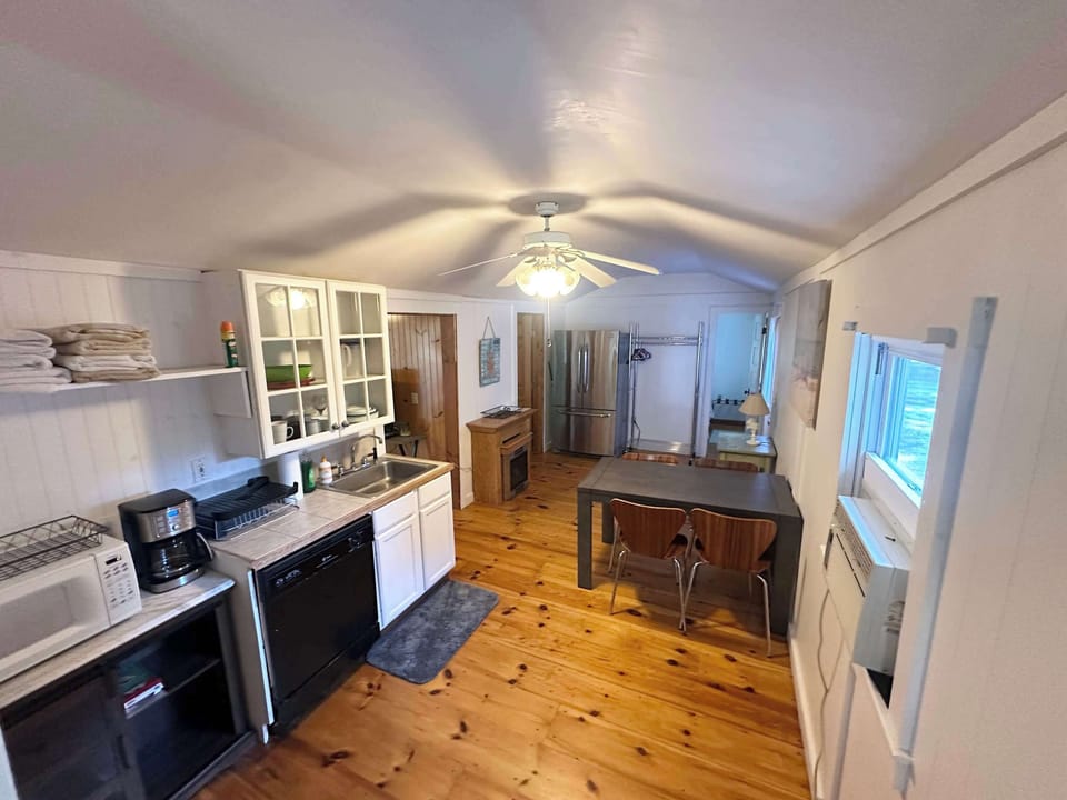 Kitchen and Dining area, full size refrigerator