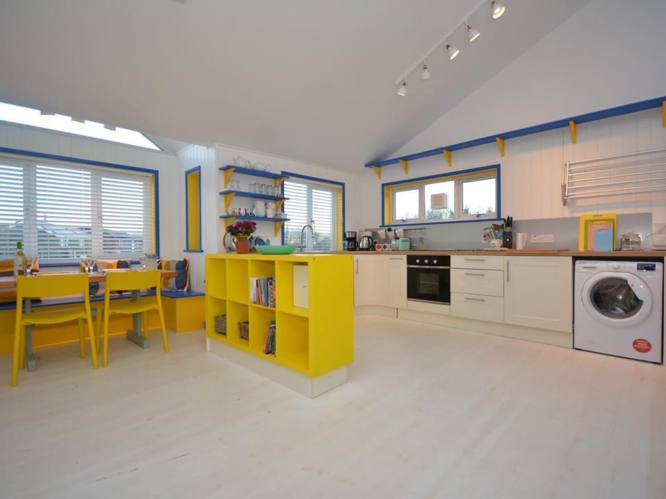 The well-equipped kitchen leads straight from the lounge/kitchen/diner