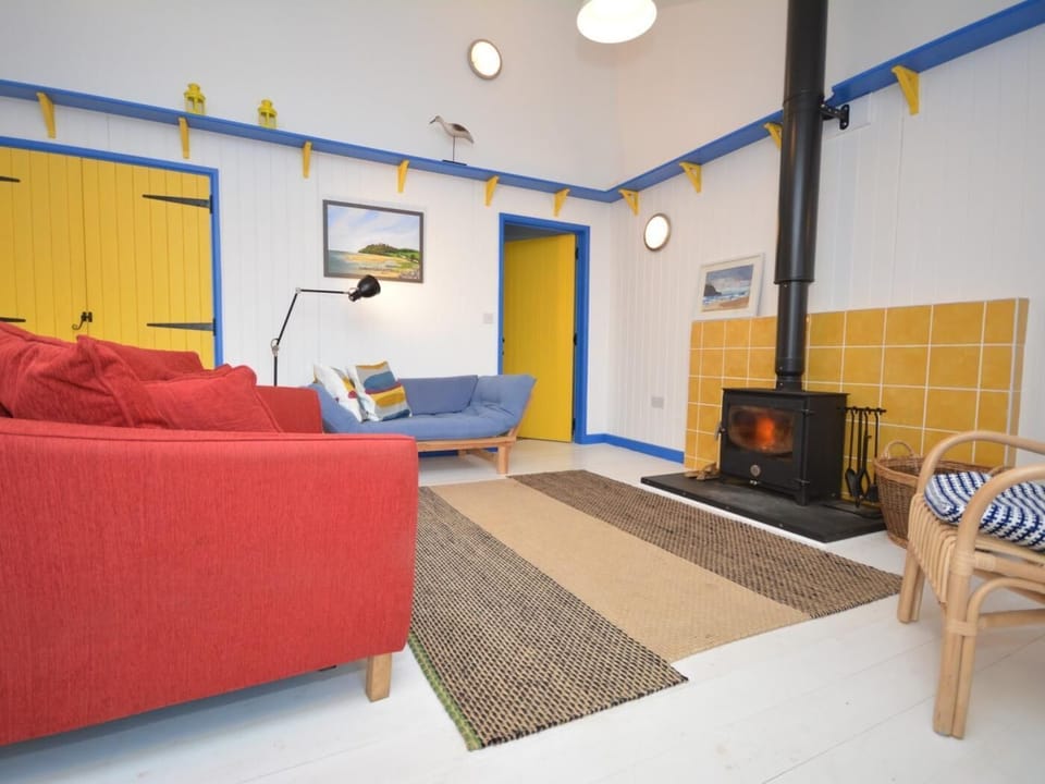 A cosy wood burner to snuggle up in front of after a day at the beach
