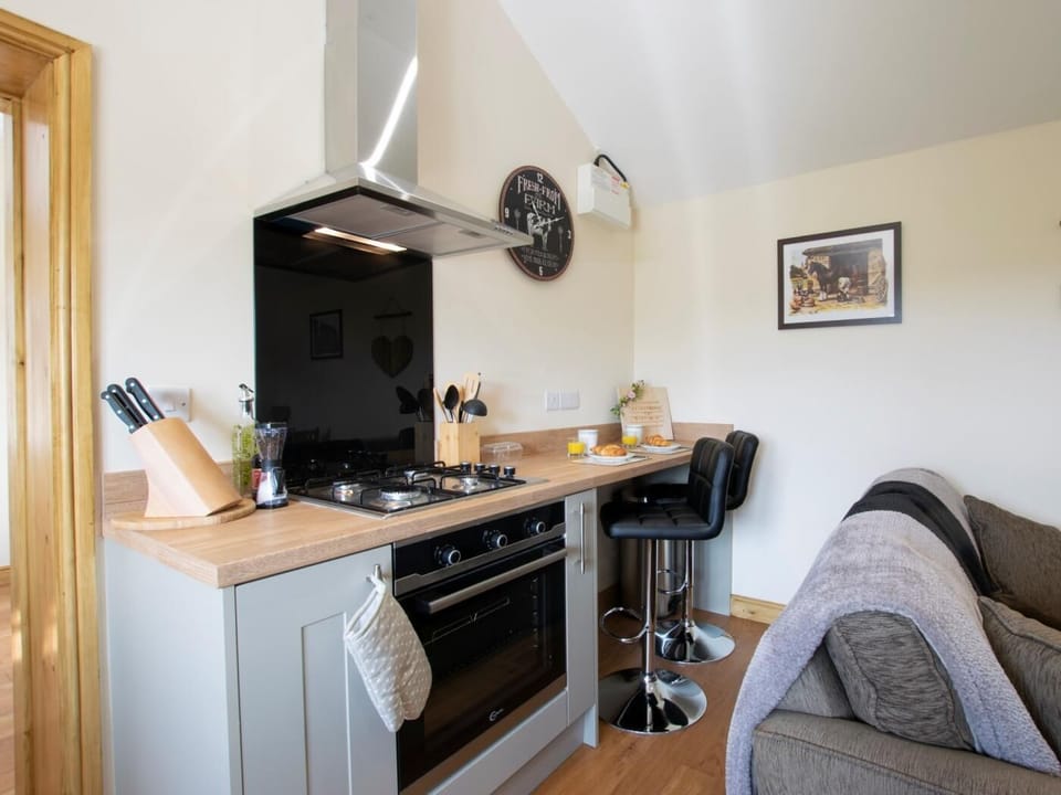 Kitchen area with breakfast bar