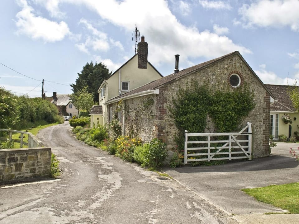Looking towards the property, set in a tranquil village location