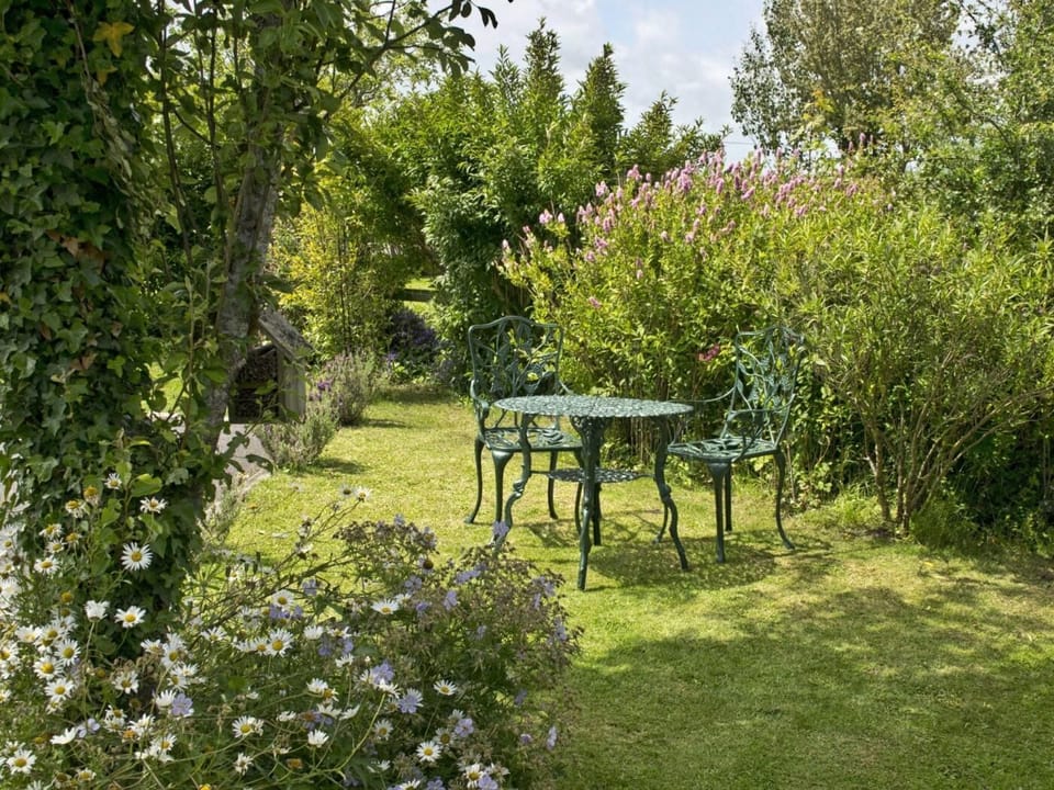 Relax in the outdoor seating area with a coffee