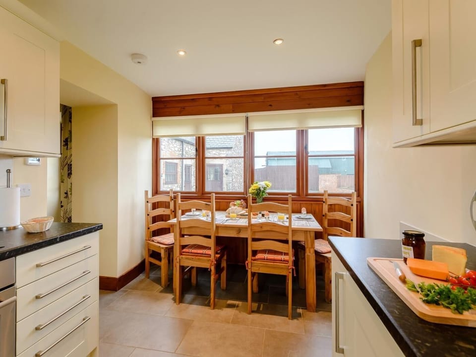 Natural light floods into the kitchen