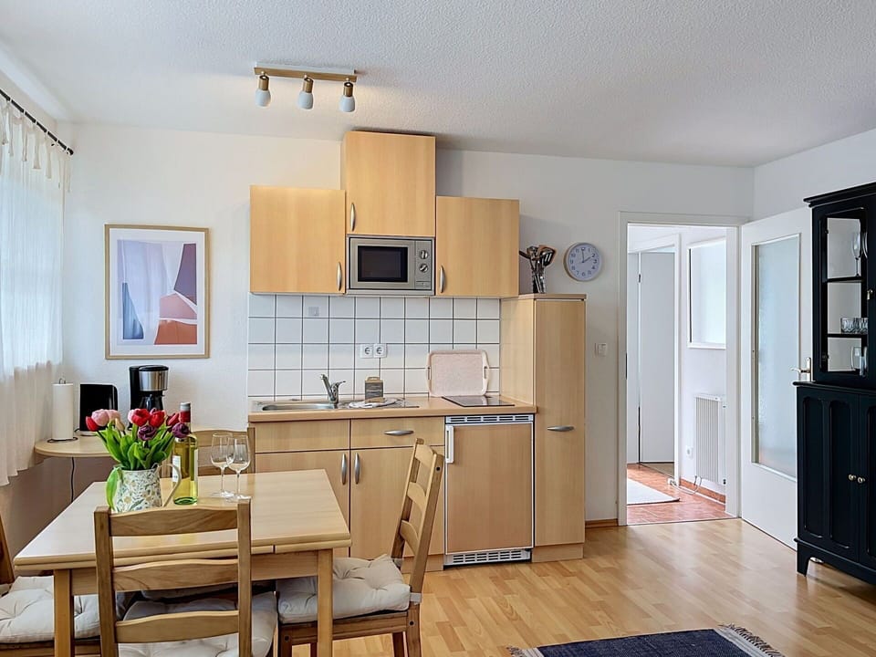 Furniture, Interior Design, Flooring, Wood, Floor, Kitchen, Room, Chair, Table, Lighting