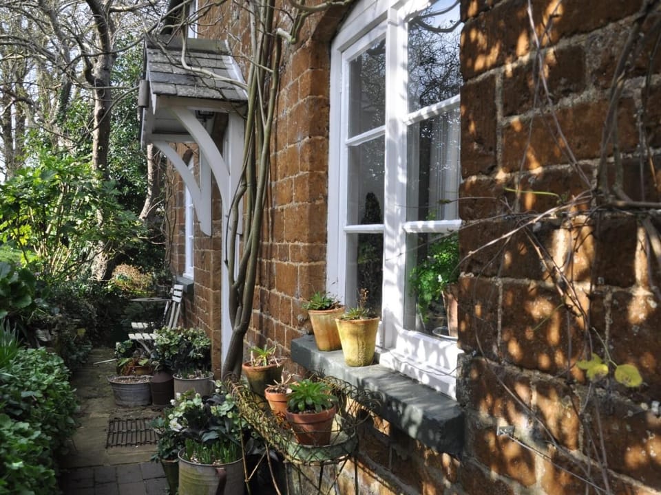The cottage has established well stocked borders throughout the gardens
