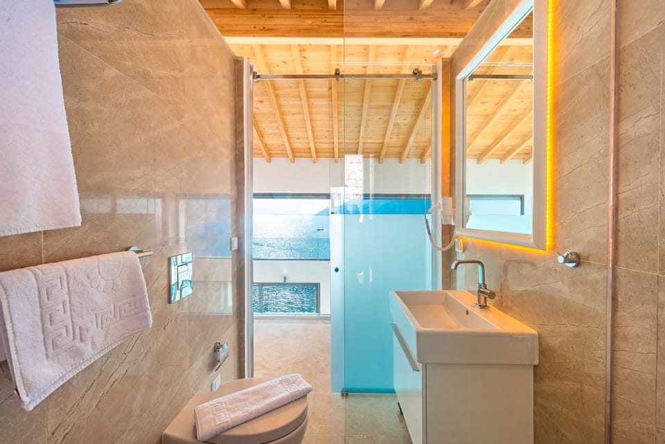 Lighthouse Lofts - Villas | Bathroom | Hair dryer, bathrobes, slippers, bidet