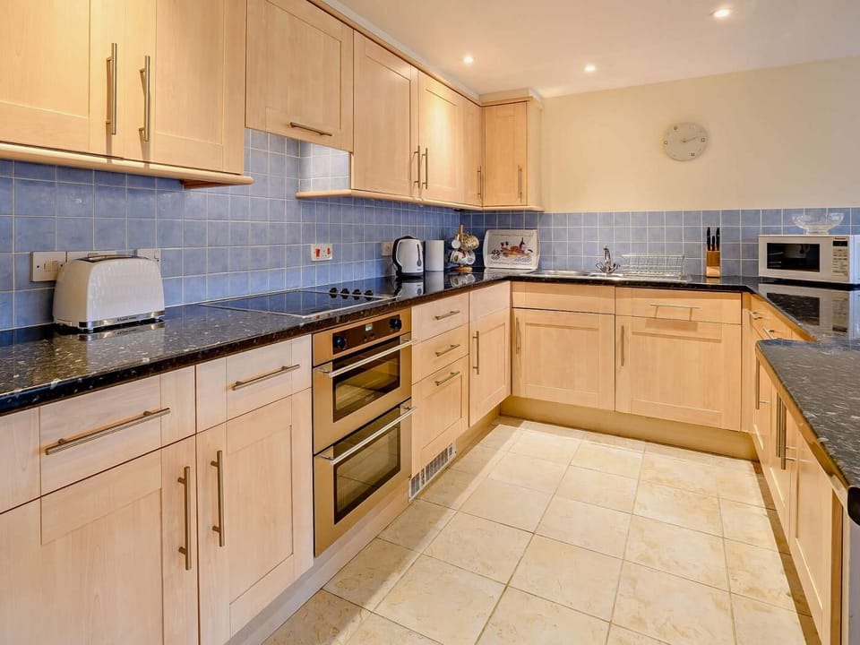 Kitchen area with a handy breakfast bar