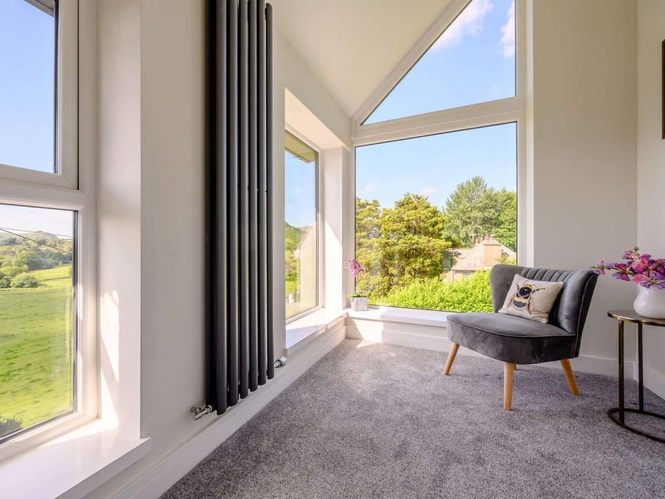 The master suite boasts its own private sunroom