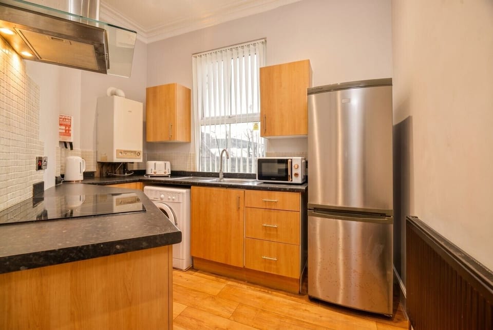 Well-stocked kitchen with big fridge freezer and everything you need.