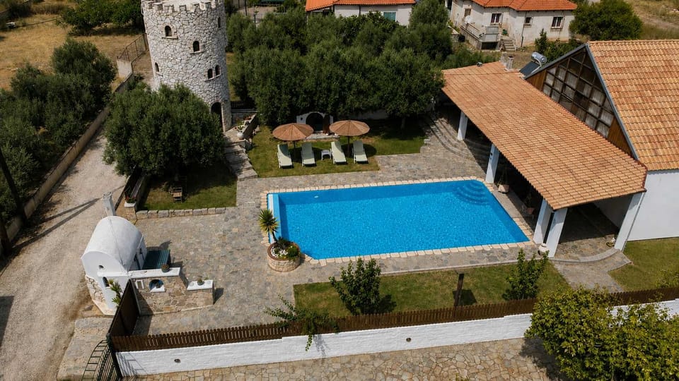 Entrance of the stone tower leading right to the pool