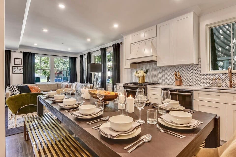 Kitchen | Custom Chef's Kitchen with Island and Bar Seating | Unit on One Level