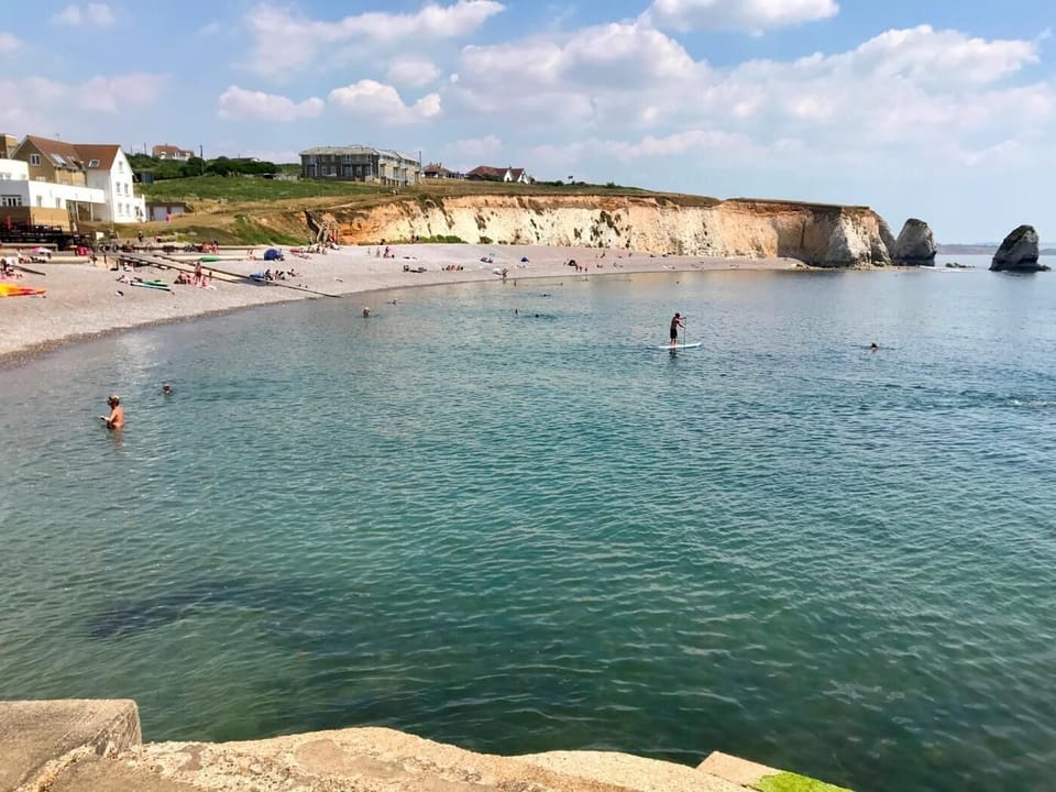 The fabulous view across Freshwater Bay, just a stone's throw away