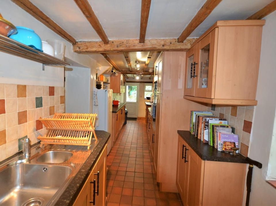 Utility area, leading onto the boot/cloak room and ground floor shower room