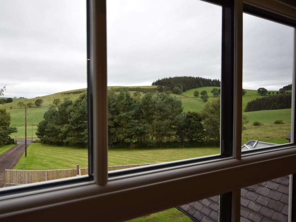 Admire the lovely views over the fully enclosed garden