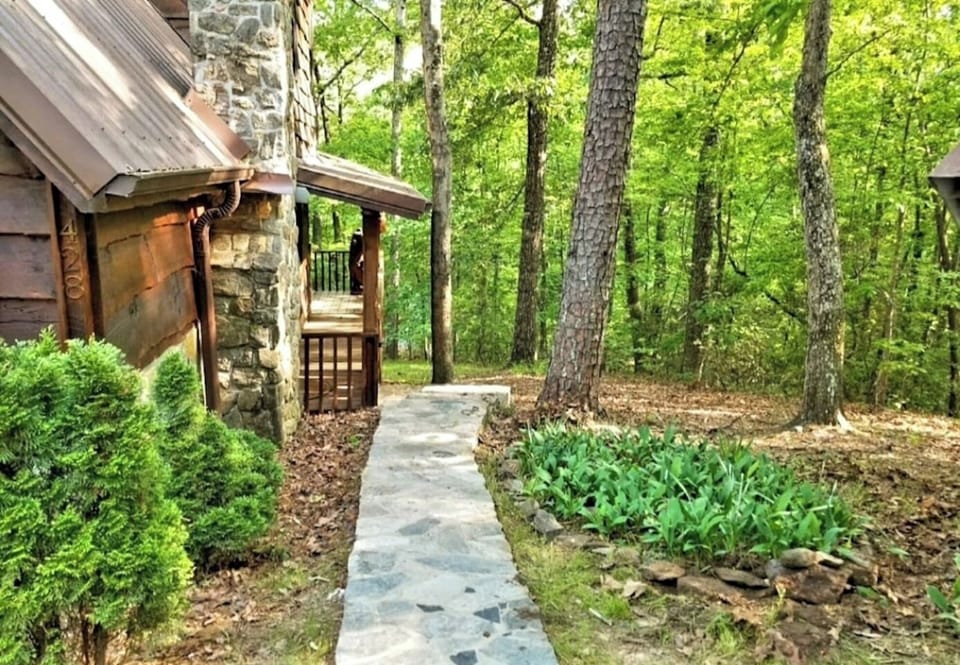 Stone pathway from parking area to the front door.