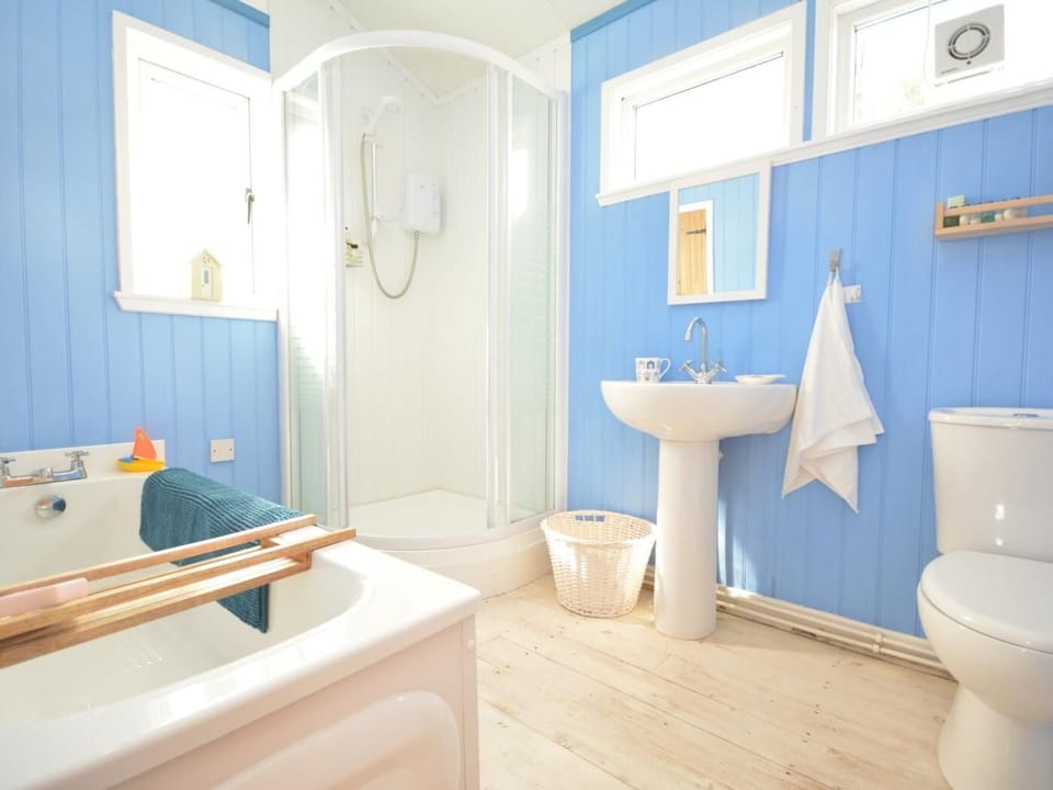 Bathroom with bath, separate shower and WC