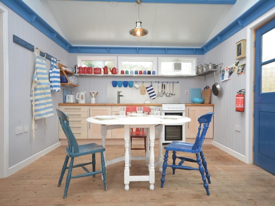 The kitchen/diner is the perfect place for a meal before a stroll along the beach