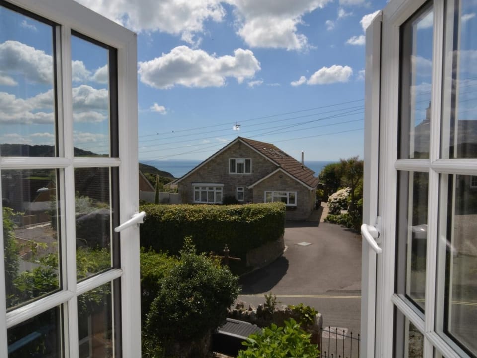 Glimpses towards the sea from the double bedroom