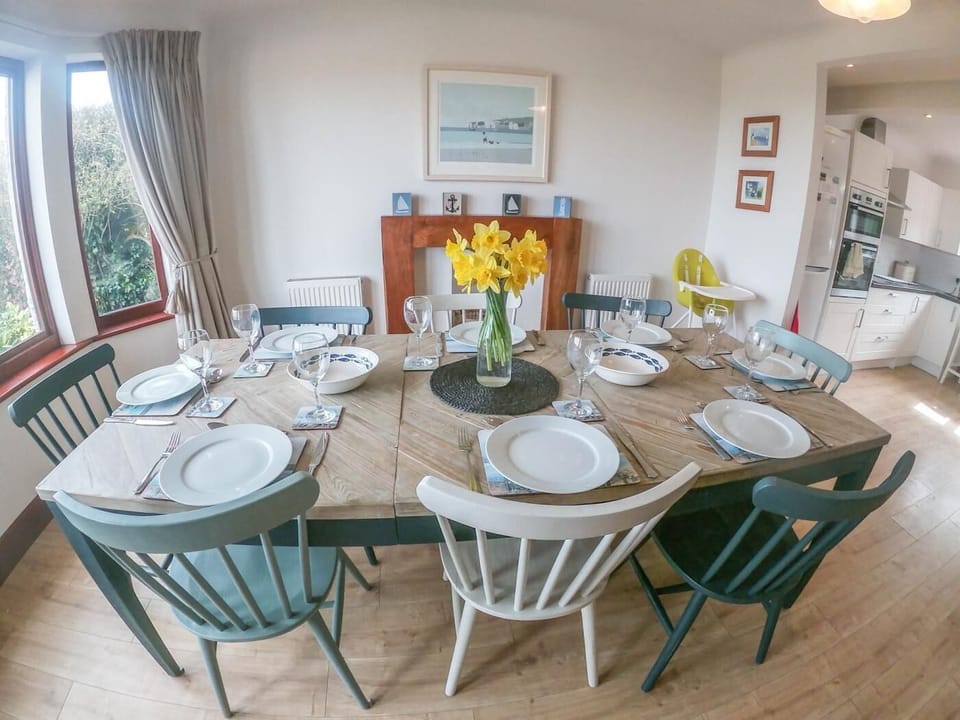 Large dining table making plenty of room for the whole family to dine together