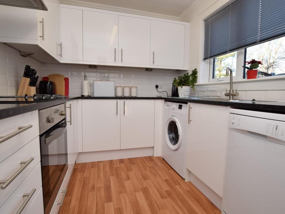 Well-equipped kitchen with lovely rear garden views