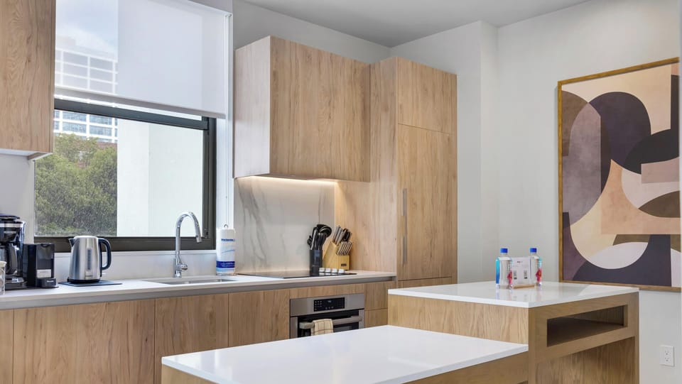 Condo, Balcony, City View | Private kitchen | Espresso maker, fridge, microwave, cookware/dishes/utensils