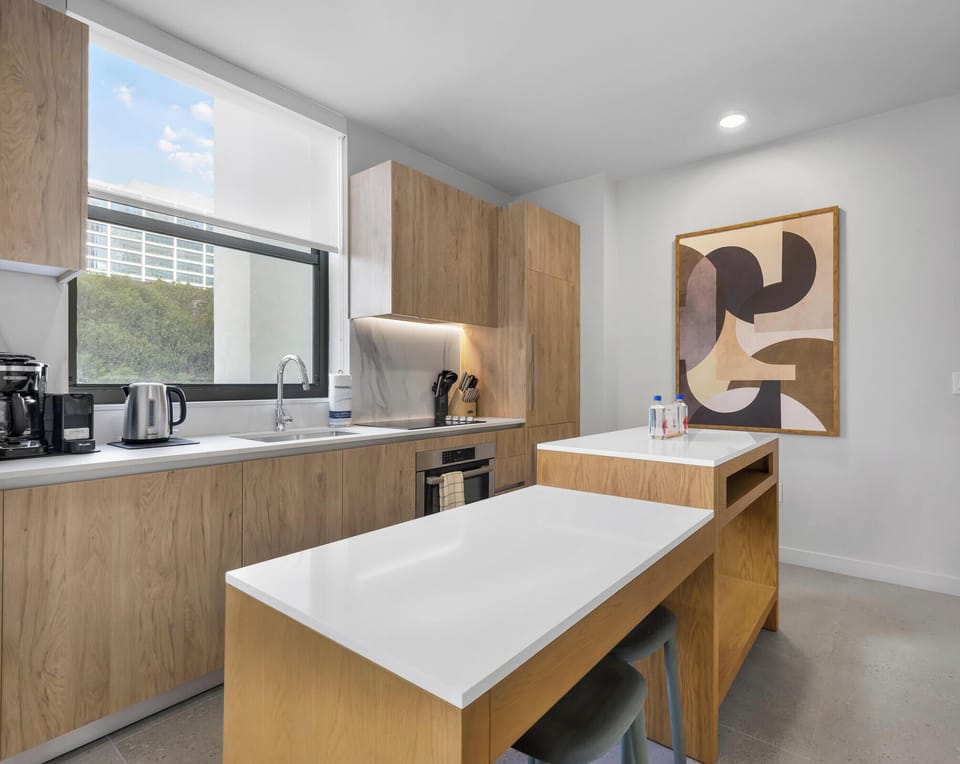 Condo, Balcony, City View | Private kitchen | Espresso maker, fridge, microwave, cookware/dishes/utensils