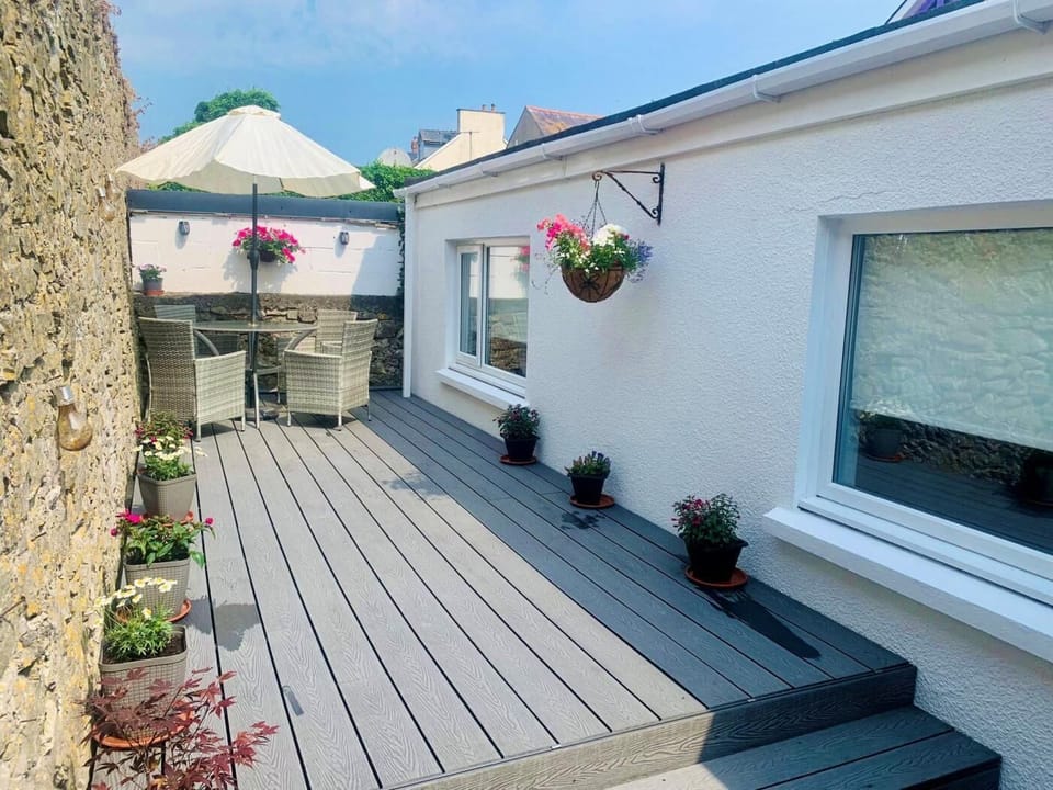 From the kitchen there is a lovely patio area to enjoy al fresco dining