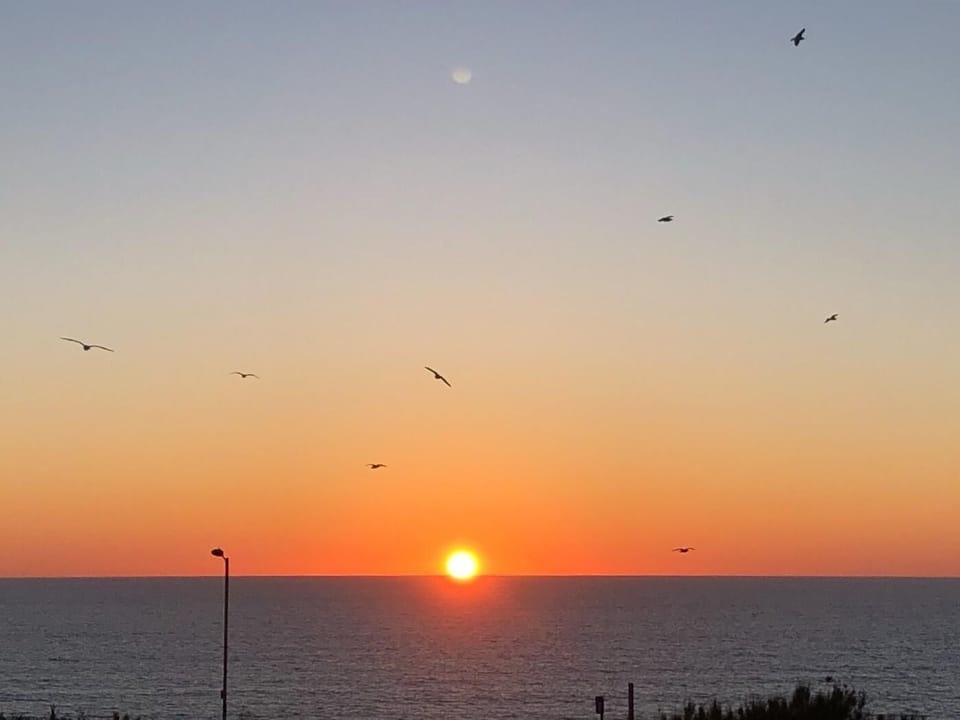 End each day with a romantic sunset from the balcony