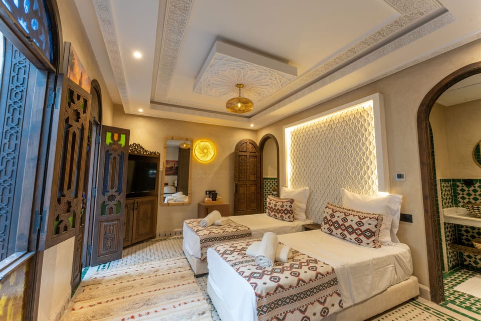 Deluxe Double or Twin Room, Balcony, Courtyard View | Minibar, in-room safe, desk, laptop workspace