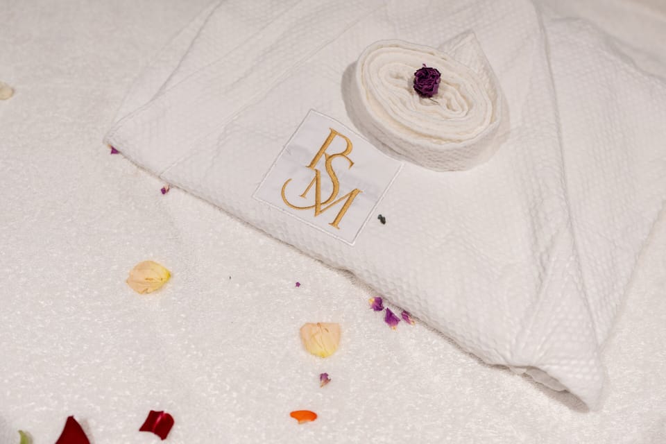 Shower, hair dryer, slippers, towels