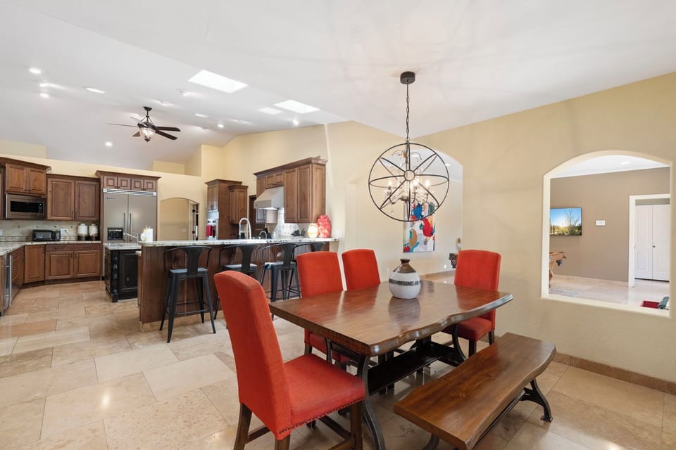 Spacious dining area with open-concept kitchen.