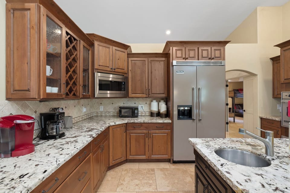 Modern kitchen with spacious island and bar seating.