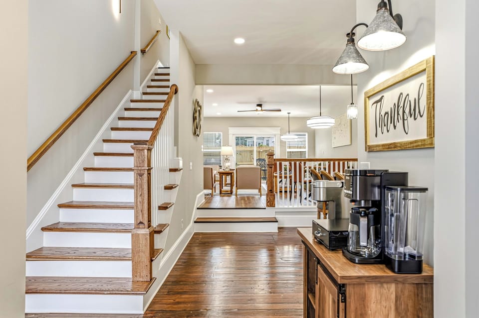 Original hardwood floors, a bright open layout, and a coffee bar ready for slow mornings.