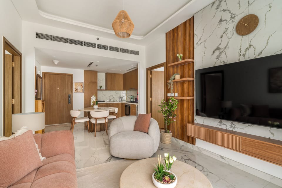 Deluxe Apartment, 2 Bedrooms | Living area | 50-inch Smart TV with digital channels