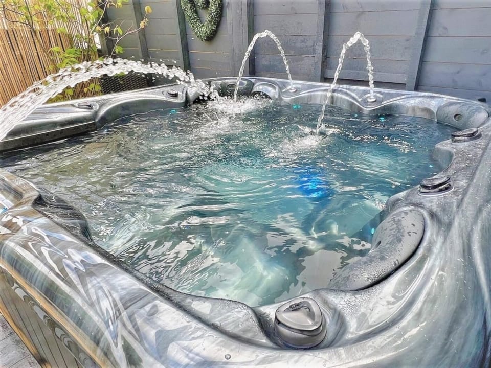 The luxury hot tub seats 5 guests so there is room for everyone