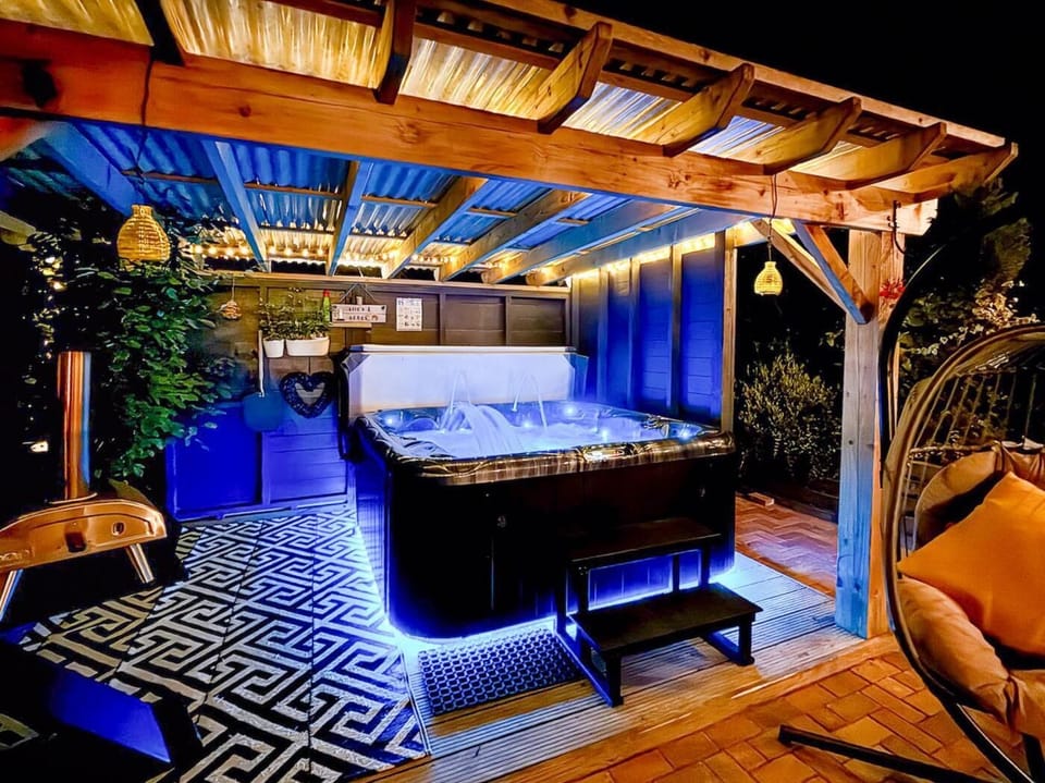 The hot tub provides the ultimate relaxation at any time of day - seats 5 guests