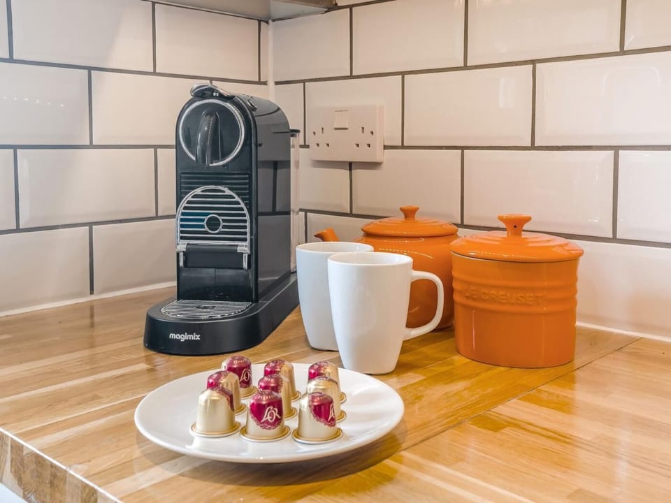 Nespresso machine using standard pods