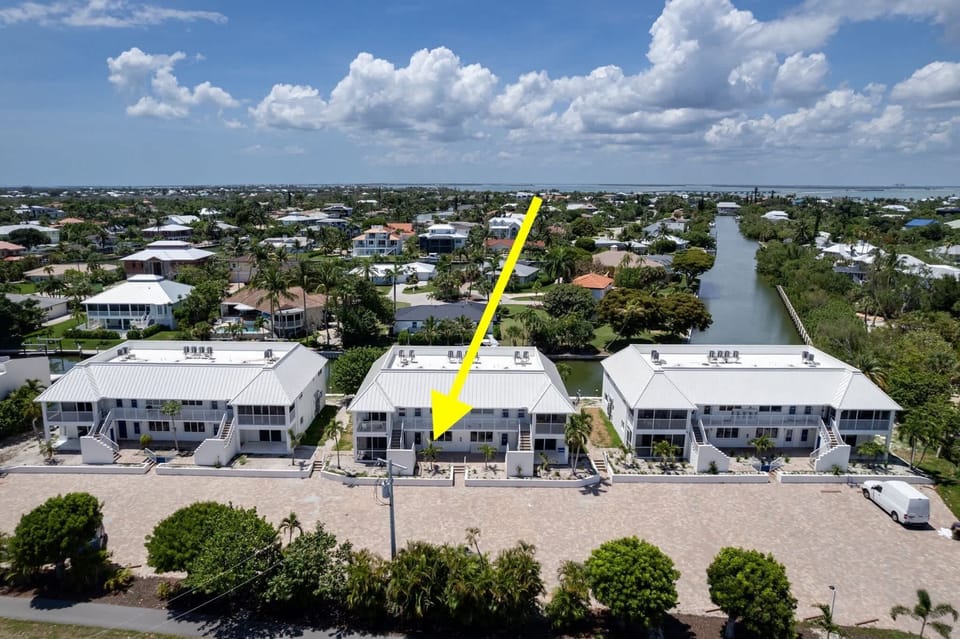 Location of unit B3. Directly adjacent to the canal and feet from the beach. 