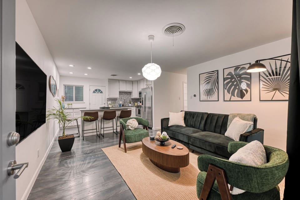 Main living area with easy access to the kitchen and front entry