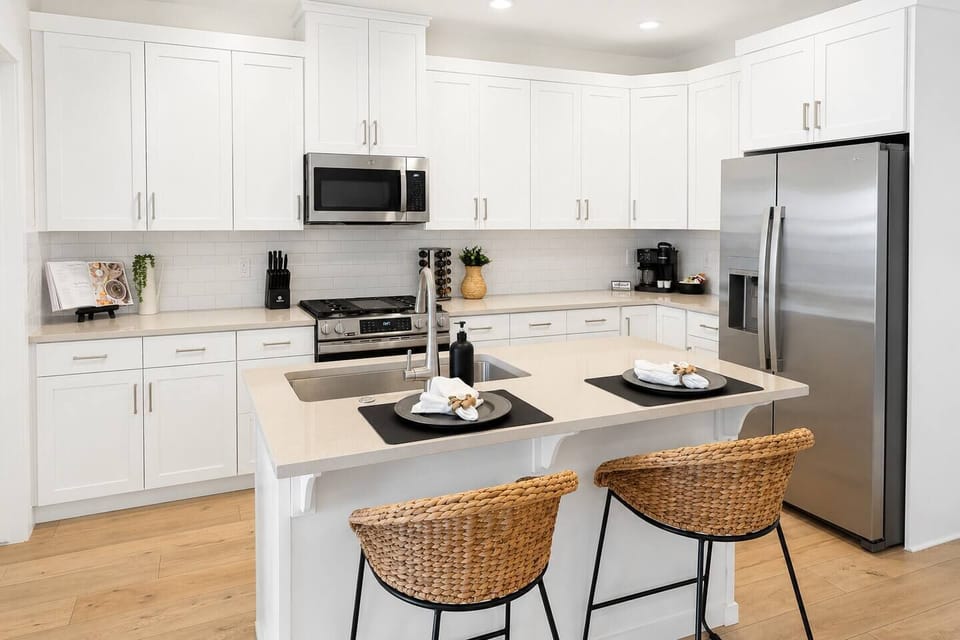 Beautifully appointed kitchen with everything you need to cook, gather, and entertain—complete with island seating and thoughtful touches throughout.