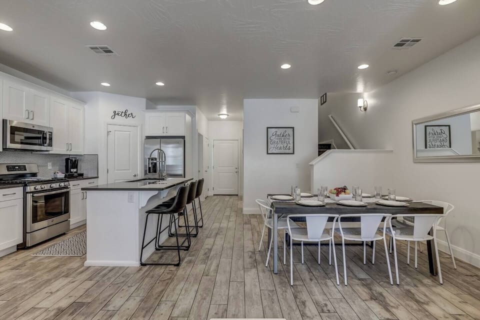 Open-concept kitchen with ample storage and all the tools needed for a great meal.
