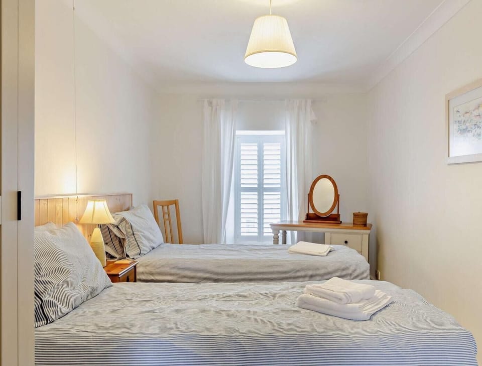 The twin room is equally simple and relaxing