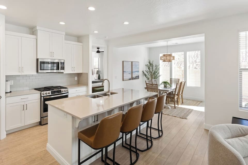Kitchen island bar seating for 4 with plenty of room to prepare and enjoy meals together 
