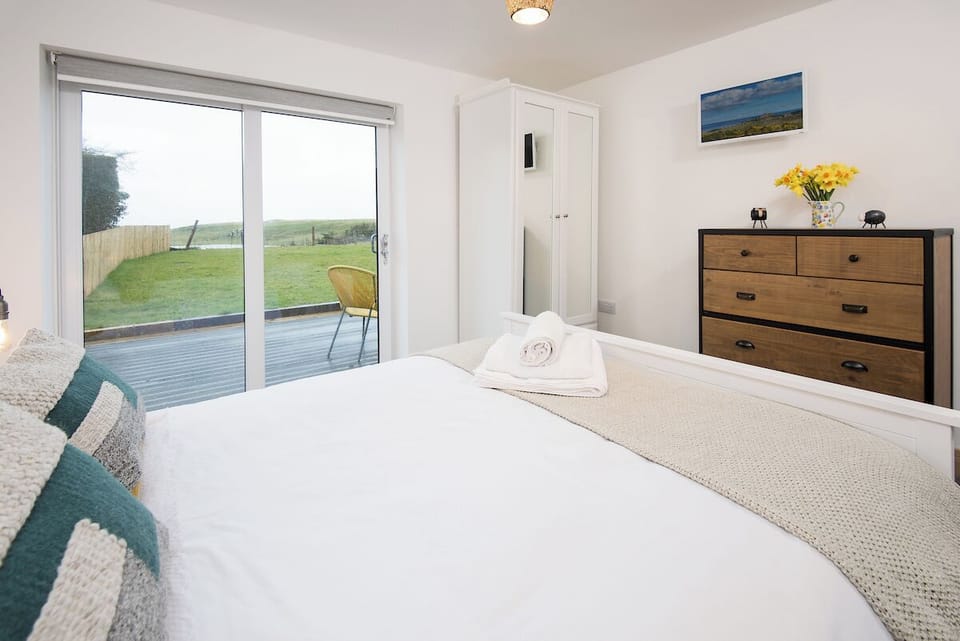 Wake up to views of green fields. 