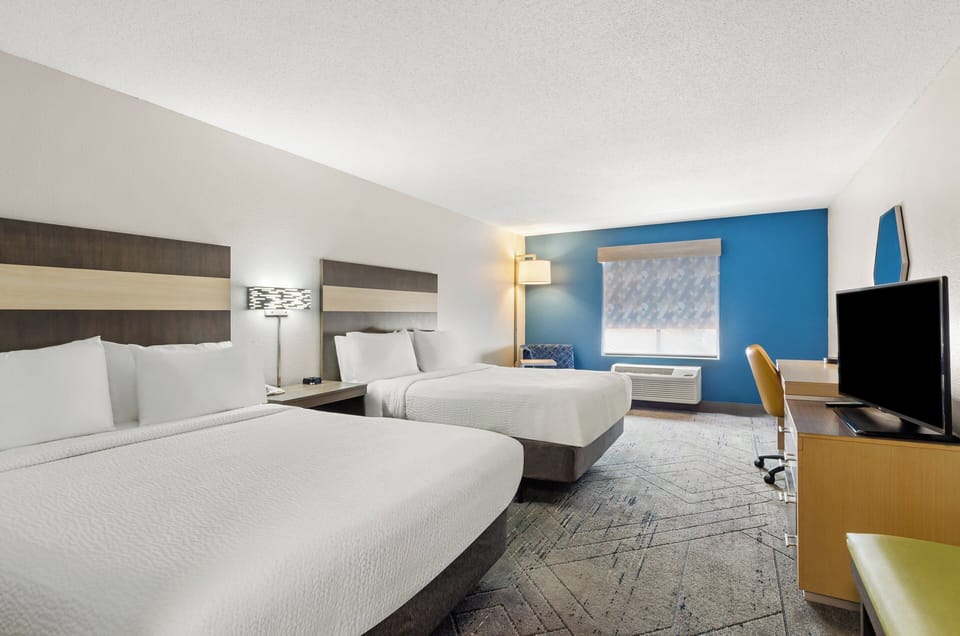 In-room safe, desk, iron/ironing board, free cribs/infant beds