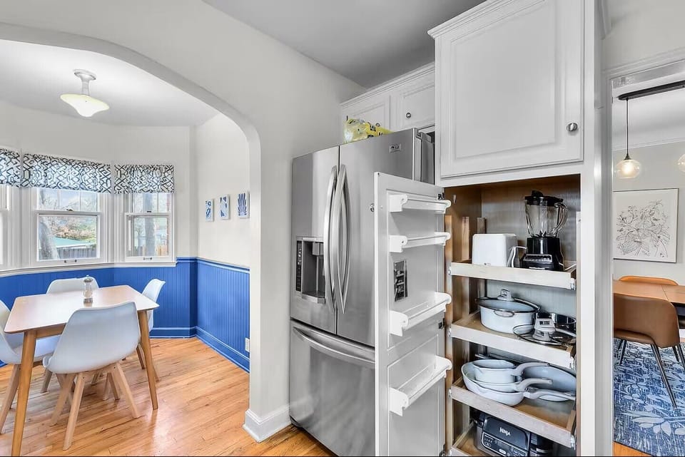 Whether you're preparing a quick breakfast or a family feast, the fully stocked kitchen has everything you need to cook and dine together, including pots and pans, cooking utensils, knives, dishes, glasses, a coffee maker, blender, toaster, and more.